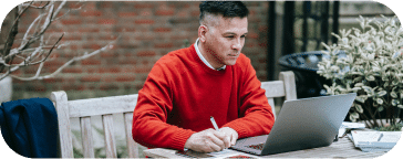 A man downloading a digital copy of the document A man downloading a digital copy of the document